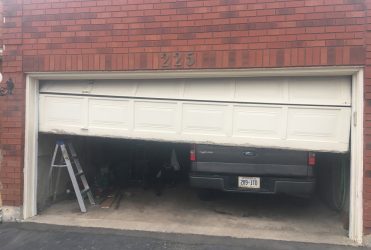 Double garage door out of Track Scarborough
