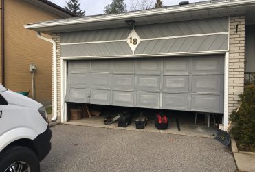 Garage Door out of Track Milton